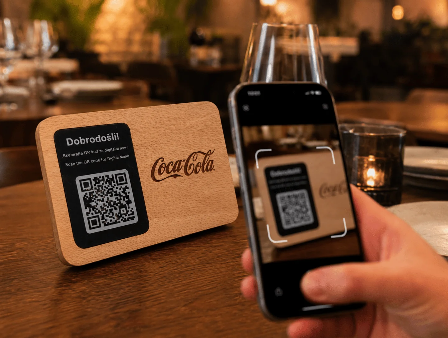 A guest scans a myWiFi Gate QR stand in a restaurant